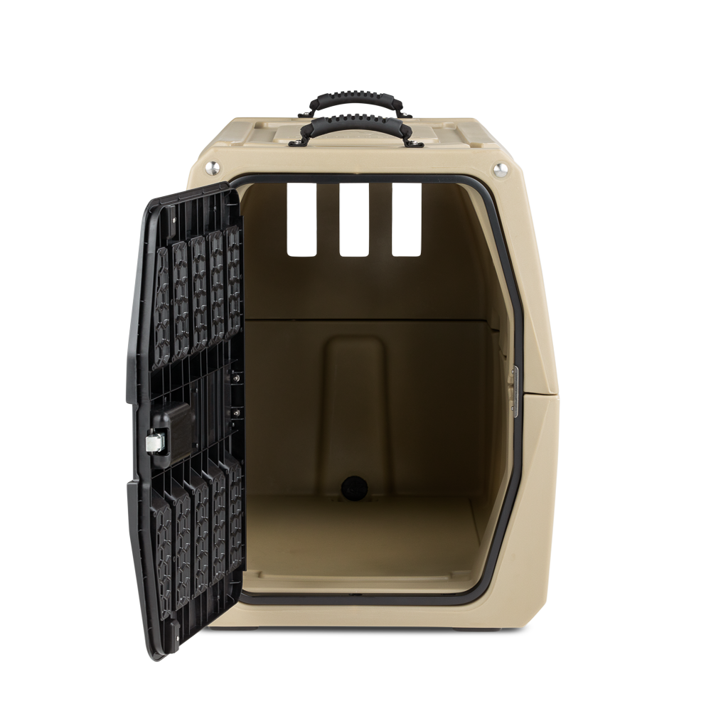 The GUNNER G1™ KENNEL - TAN is a double-walled plastic pet carrier with shock protection, three rear ventilation openings, a top handle, and a left-opening black metal door. Its beige design offers safety and visibility for your pet.