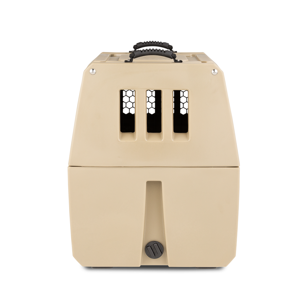 The GUNNER G1™ KENNEL - TAN is a double-walled beige pet carrier with three vertical front slats and a black top handle, offering superior shock protection, shown from the front against a white background.
