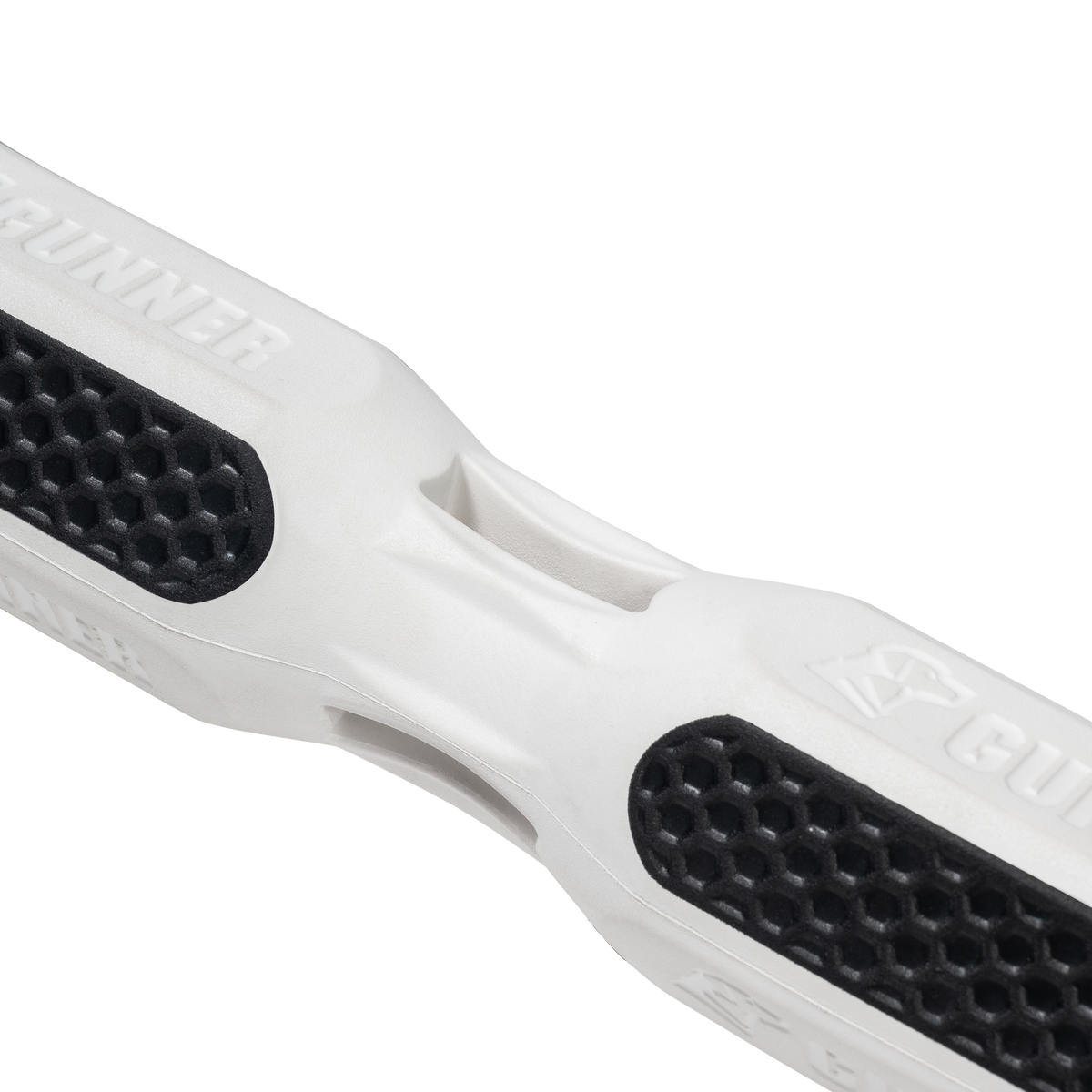 Close-up of the GUNNER BUMPER by GUNNER, a white training tool with black honeycomb-patterned grips and GUNNER embossed, designed to help you save time and strengthen your bond with your dog, shown against a plain white background.