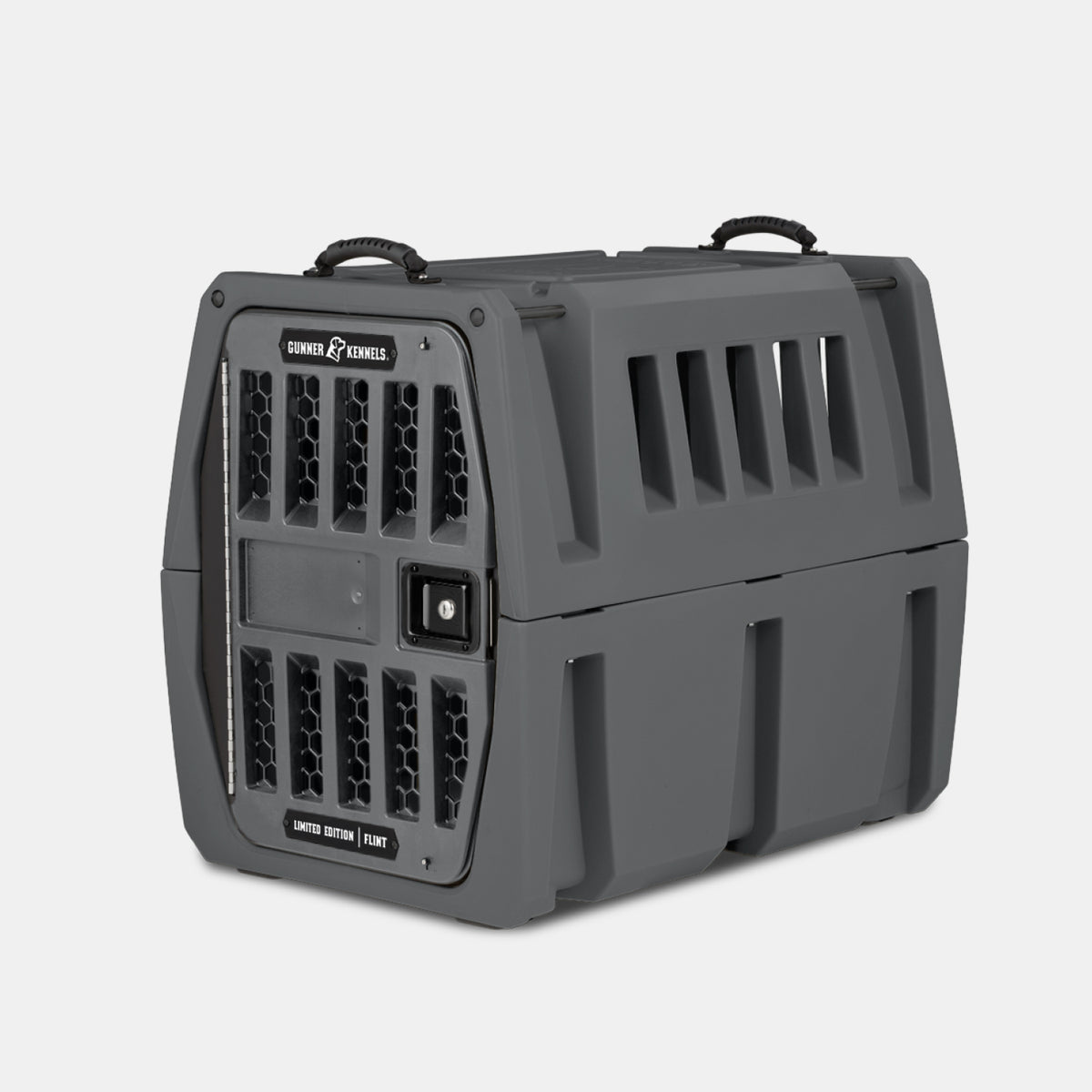 Gray hard-sided dog kennel with ventilation slats, dual handles on top, and a secure front door. The crate is sturdy and labeled “Gunner Kennels” with “Limited Edition” text on the door—perfect for your working dog’s comfort and safety.