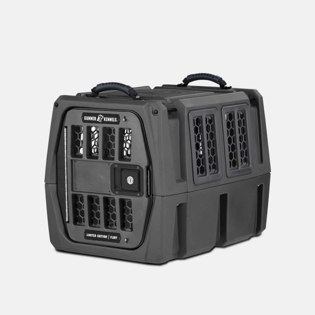 The GUNNER G1™ KENNEL - FLINT is a durable, dark gray pet kennel featuring ventilation slots on all sides, dual top carry handles, and a secure lockable front door—built tough to protect your pet like a premium phone case.