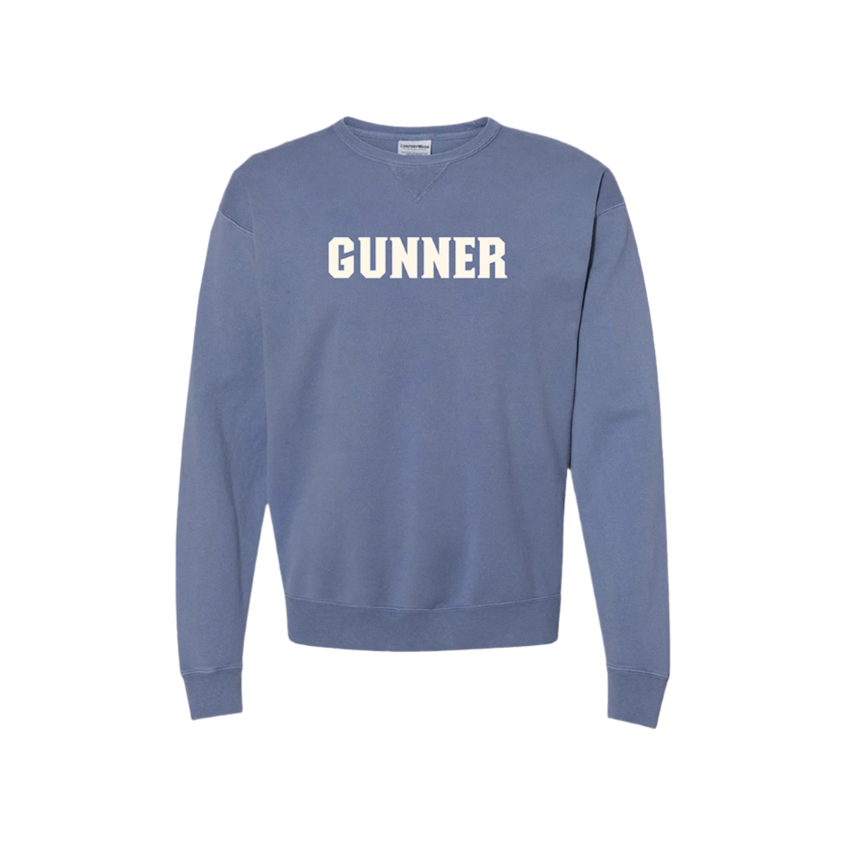 The GUNNER Crewneck, by GUNNER, is a warm, thick blue sweatshirt with “GUNNER” in bold white letters across the chest. Wind resistant for extra comfort. Displayed on a plain white background.