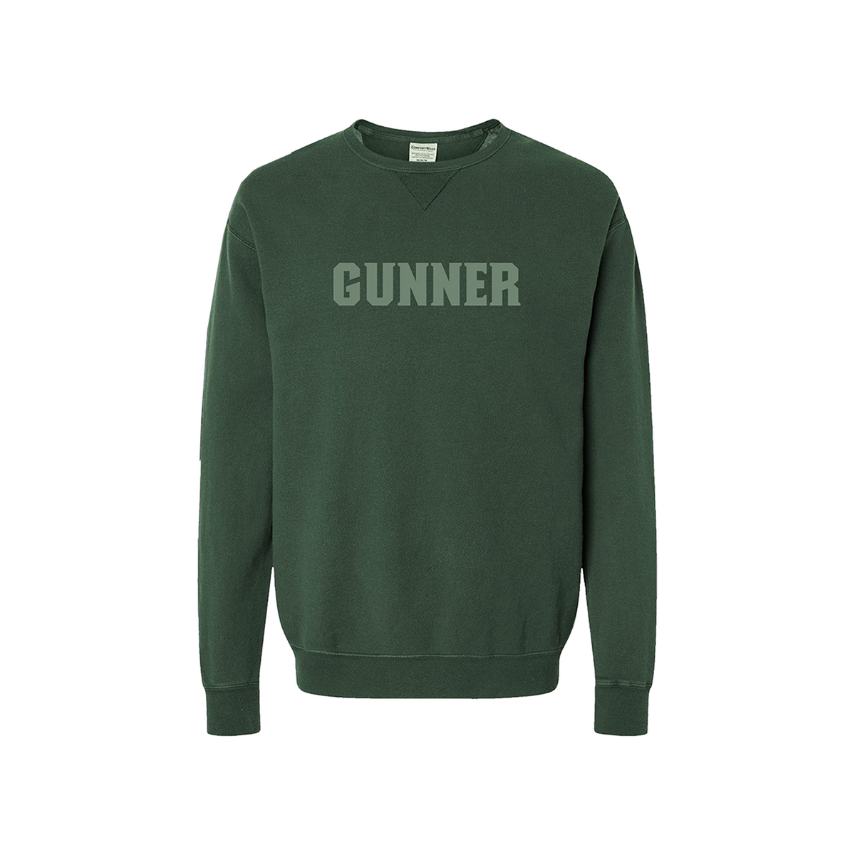 The GUNNER Crewneck by GUNNER is a thick, forest green sweatshirt with wind resistance. It features GUNNER boldly printed across the chest, long sleeves, and ribbed collar, cuffs, and hem for warmth.