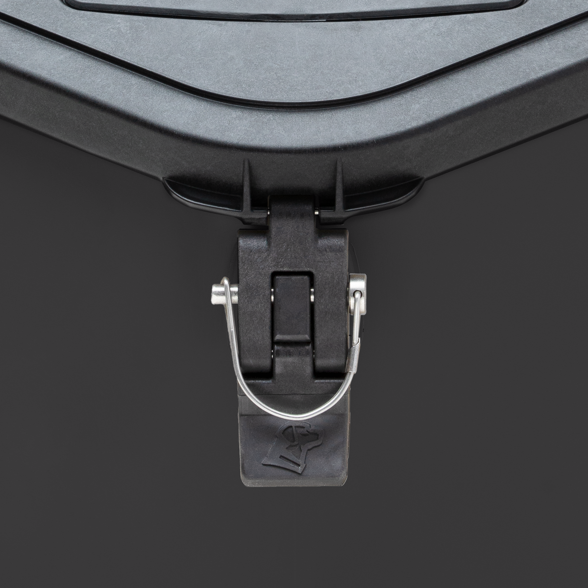 Close-up of the GUNNER FOOD CRATE - Black by GUNNER, showing its black plastic latch with metal locking loop, textured surface, and arrow icon—ideal for durable pet food storage.
