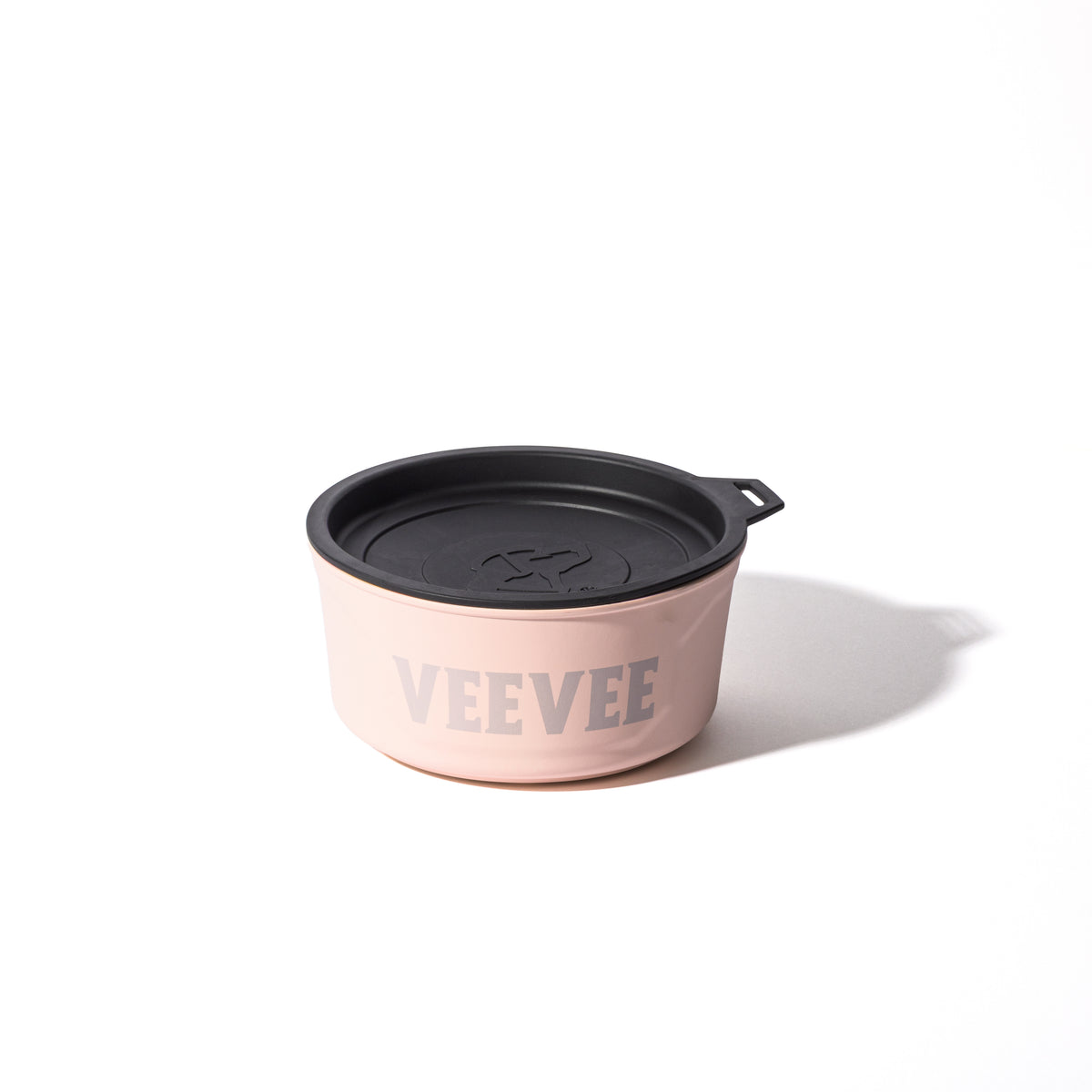 A GUNNER DOG BOWL in pink, featuring the GUNNER brand name and a black lid, sits on a white surface—ideal for pet owners looking for stylish, limited edition dog accessories.