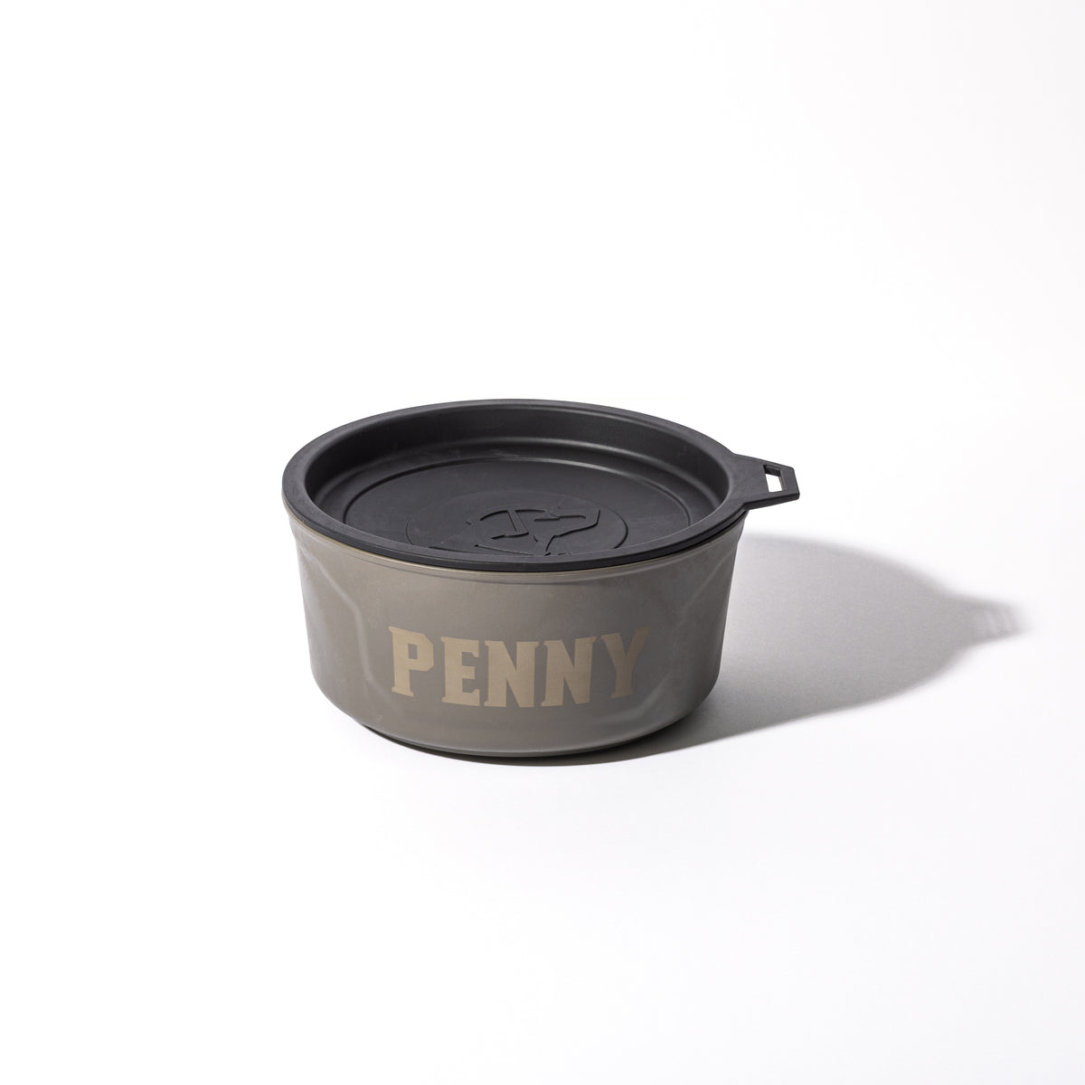 A round, gunmetal GUNNER DOG BOWL with a black lid and the brand name GUNNER in bold light letters on the side, shown on a white background.