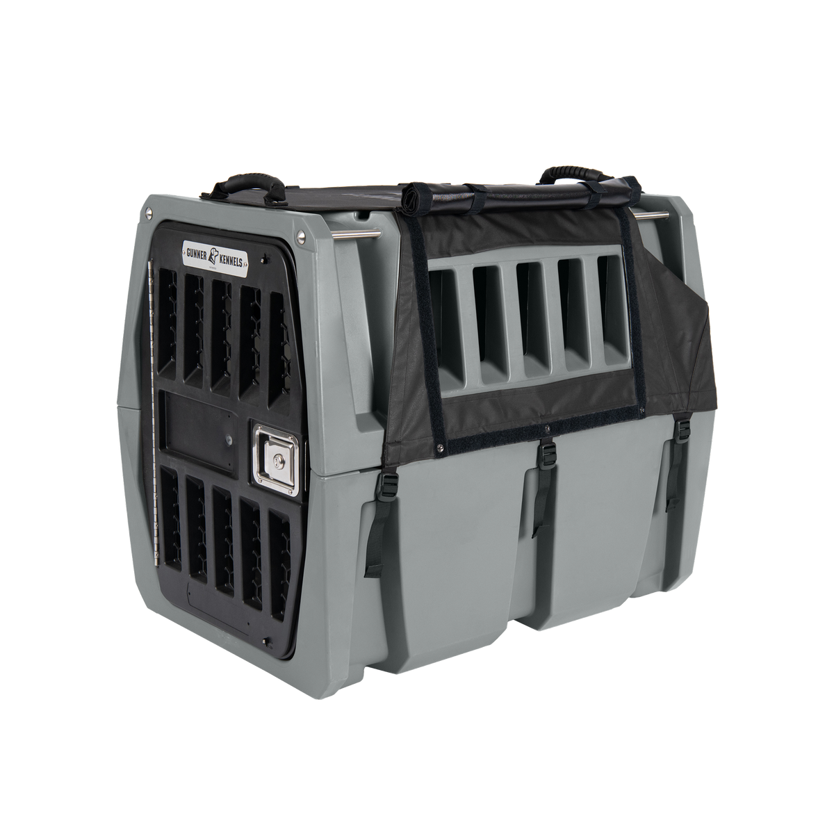The GUNNER ALL-WEATHER KIT 2.0 BLACK is a durable, gray plastic pet crate featuring a metal door and side ventilation slats for secure animal transport, now upgraded with UV protection to ensure long-lasting performance outdoors.