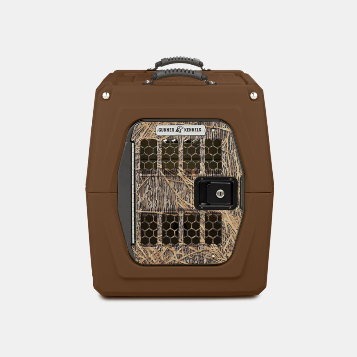 The GUNNER G1™ KENNEL in Susquehanna/Mossy Oak Shadow Grass, a brown pet crate with a metal door, features ventilation holes and a camouflage pattern—ideal for duck & goose hunters—shown front-facing against a plain white background.