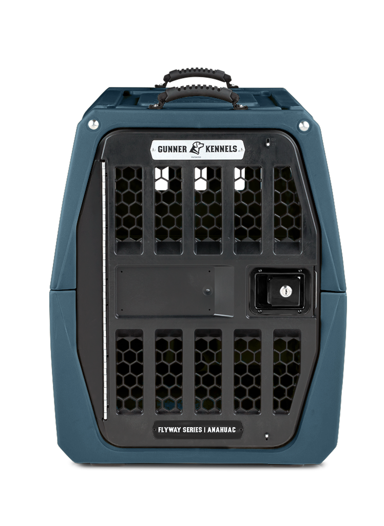 A sturdy, blue plastic working dog kennel with a black metal door featuring a honeycomb design. The crate has a handle on top and labels reading Gunner Kennels and Flyway Series | Anahuac—perfect for your outdoor gear needs.