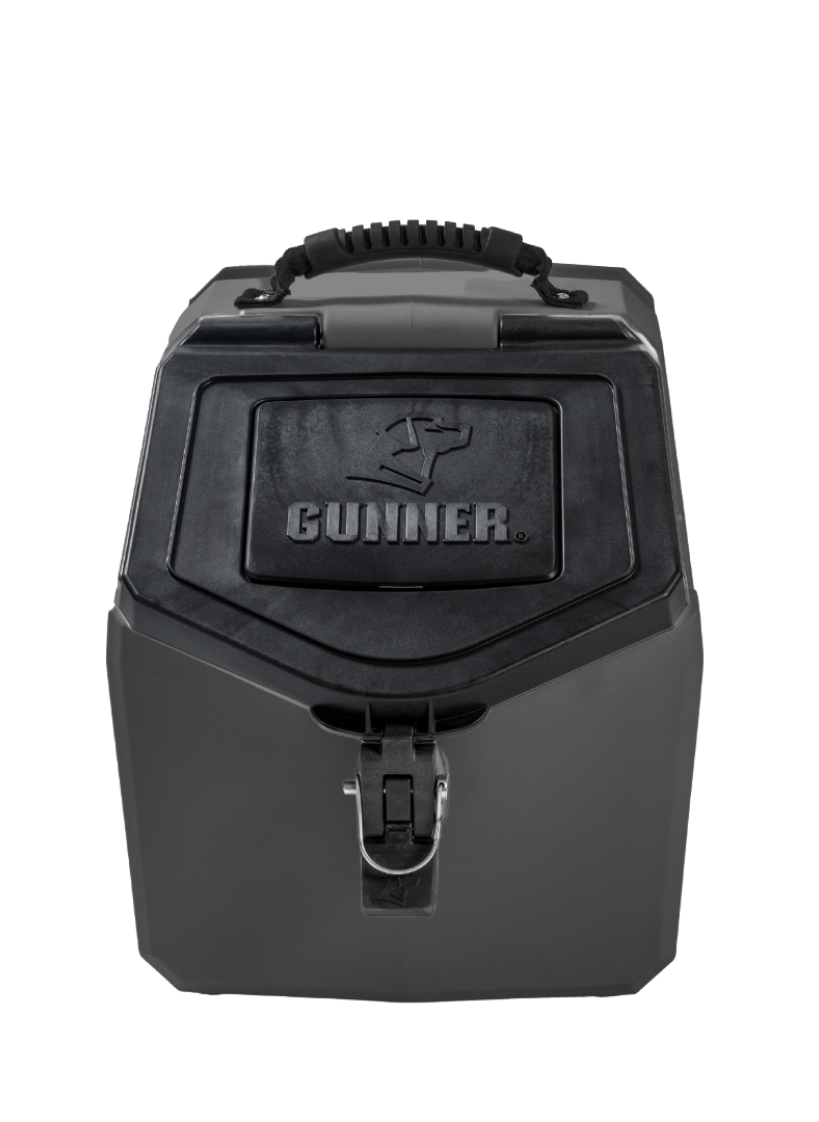 A black and gray hard-sided kennel with a sturdy handle, secure latch, and the brand name GUNNER embossed on the front panel—ideal outdoor gear for your working dog.
