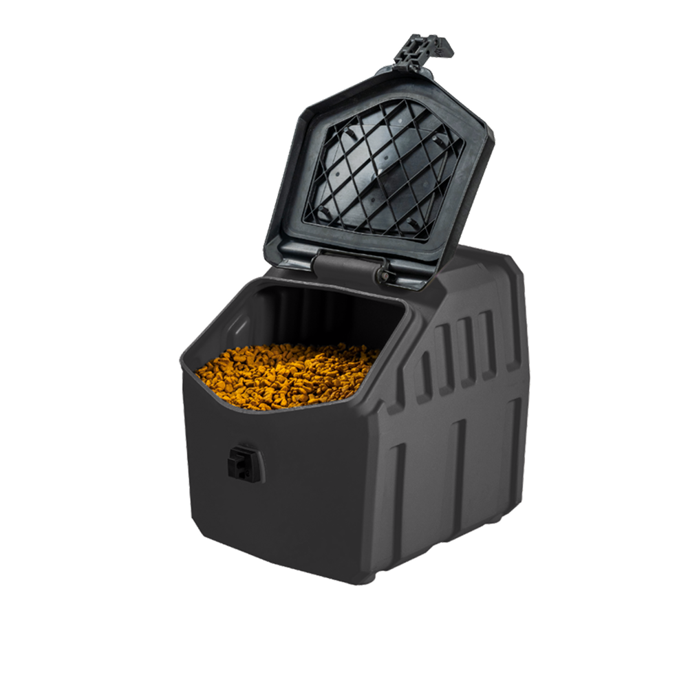The GUNNER FOOD CRATE - Black by GUNNER is a black plastic dog food storage container with a hinged lid, shown partially open to reveal stored pet food. This odor-proof container keeps your pet’s food fresh and protected.