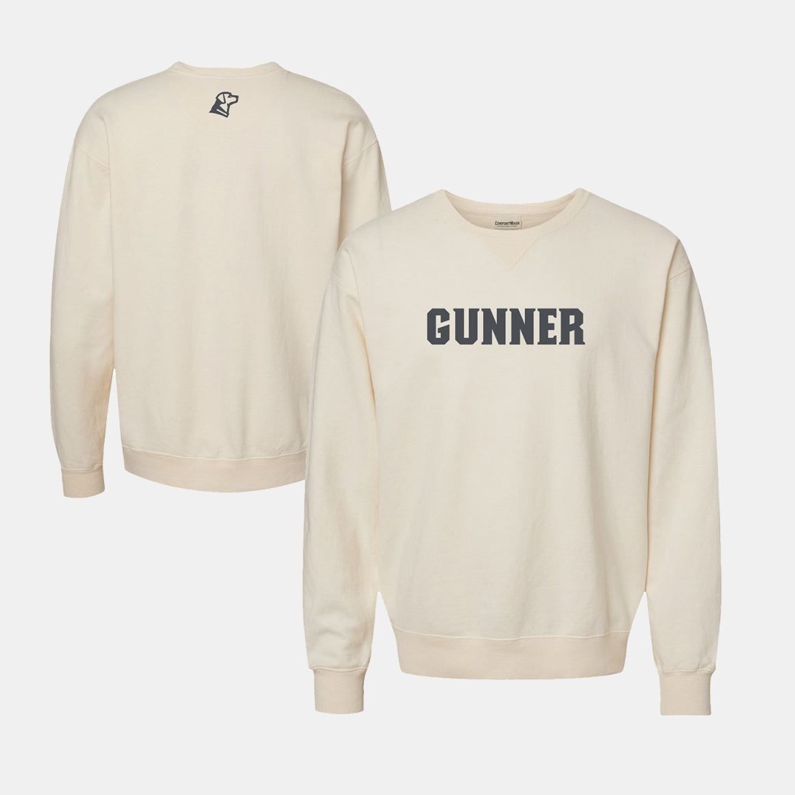 Cream-colored crewneck sweatshirt with GUNNER printed in bold gray letters on the front, inspired by working dog outdoor gear. The back features a small graphic near the collar. Both front and back views are shown against a white background.