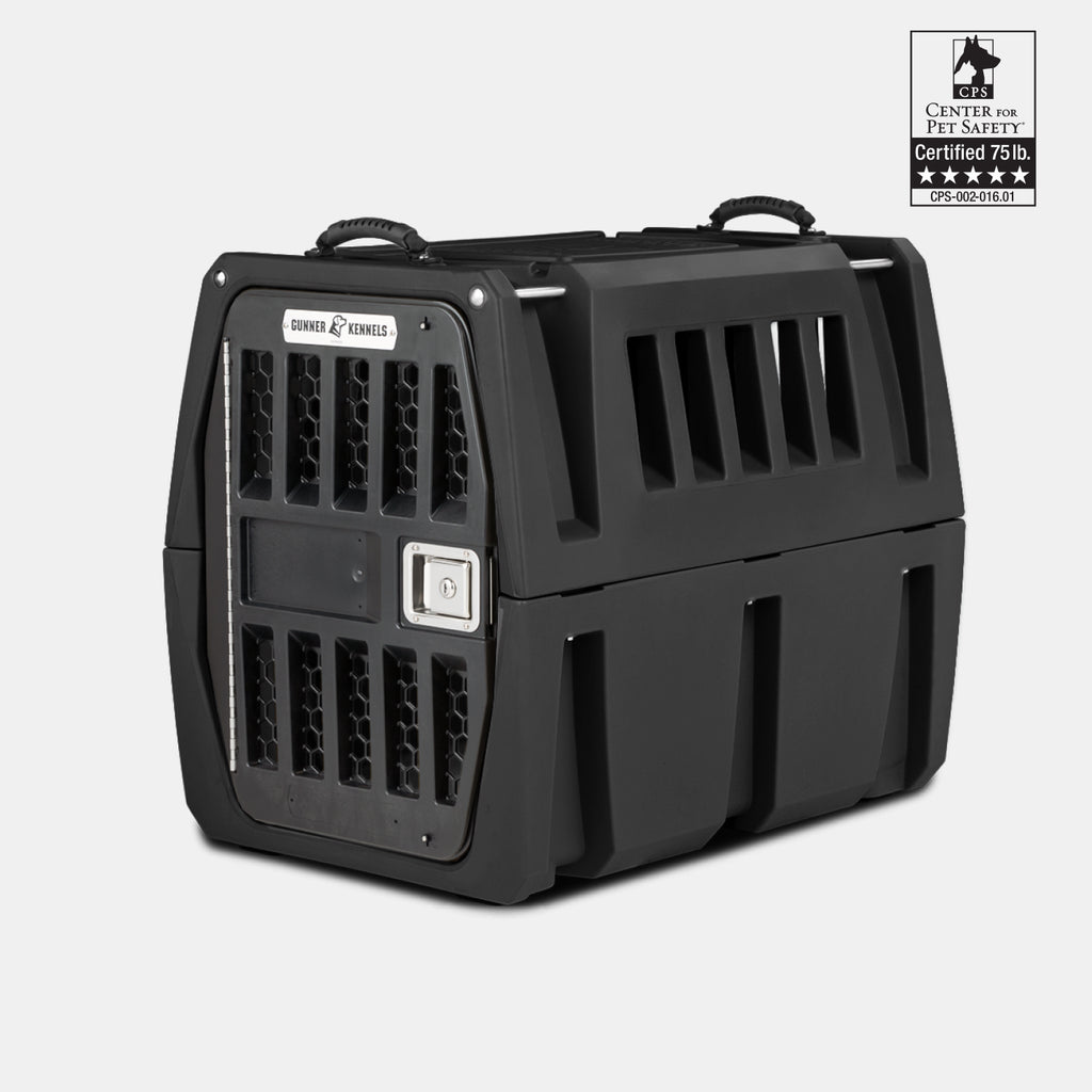 The GUNNER G1™ KENNEL - BLACK features ventilation slats, secure latched door, top carrying handles, and a Center for Pet Safety certified label. Designed for pets up to 75 lbs.