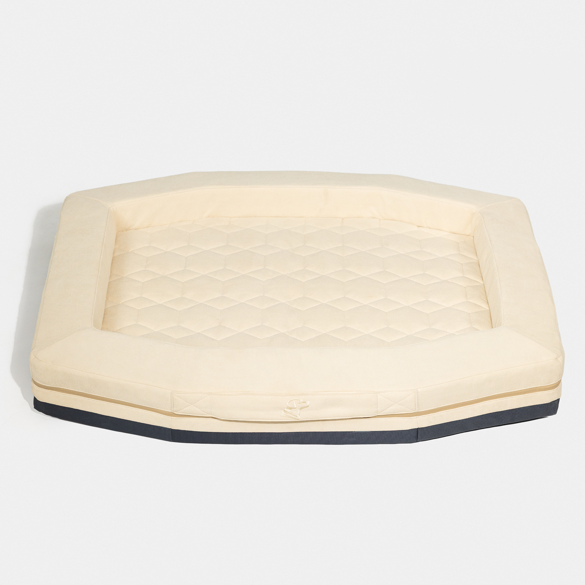 The GUNNER HOMESTEAD DOG BED Oak is a rectangular, cream quilted pet bed with raised edges and a durable black base, designed for easy cleaning, shown on a plain white background.