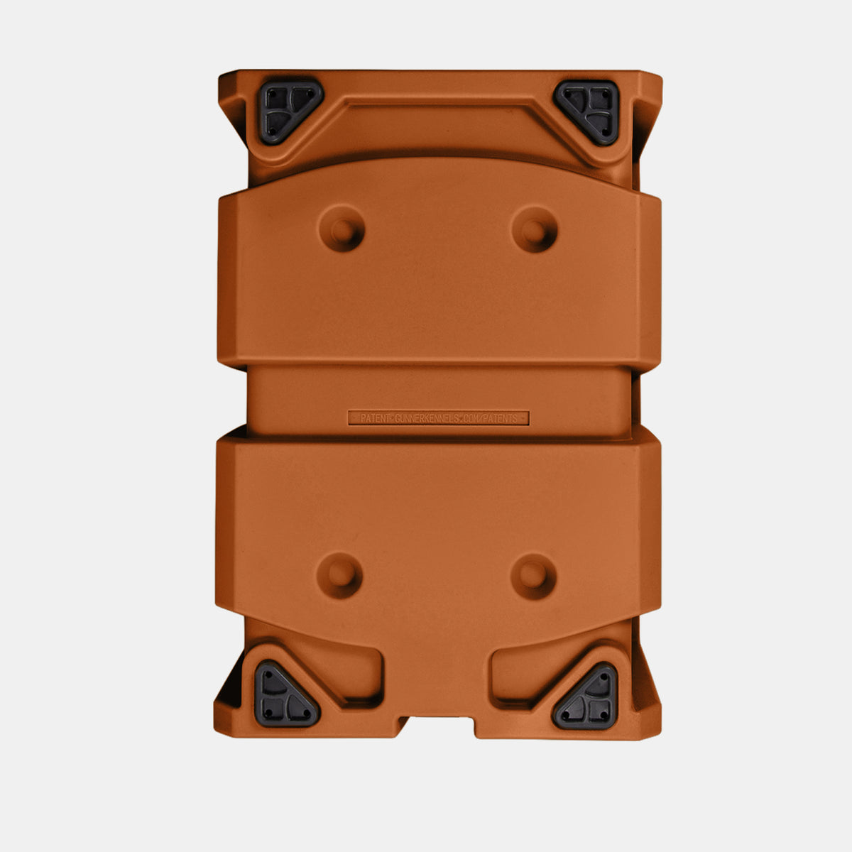 Rectangular, orange-brown rugged storage box with rounded edges, four black reinforced corner protectors, and two circular indentations on the lid—resembling the sturdy design of a dog kennel—viewed from above on a white background.
