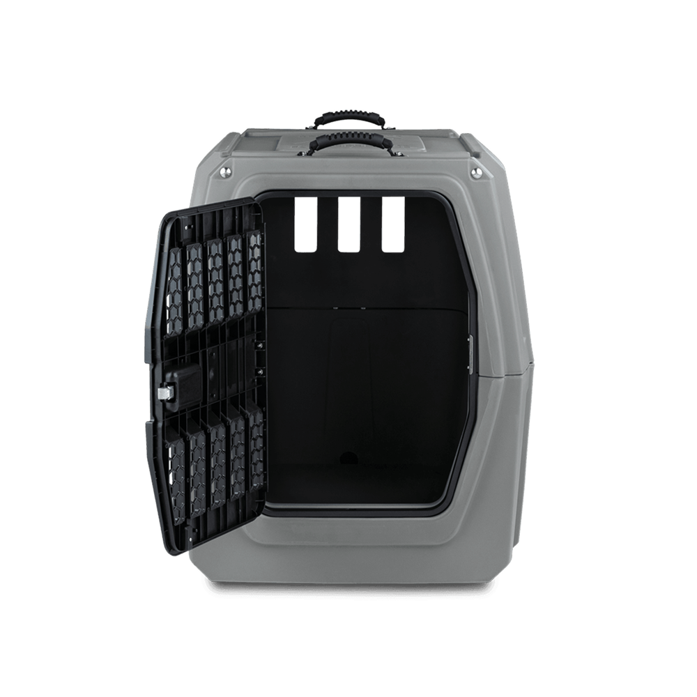 The GUNNER G1™ KENNEL in gunmetal features a gray plastic build, a black grated door that opens left, and three back ventilation slots for a safe crate experience.