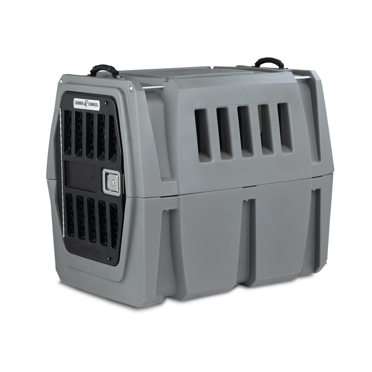 The GUNNER G1™ KENNEL - GUNMETAL is a large, gray plastic dog crate with side ventilation slats and a secure black metal front door, designed for safe animal transport.