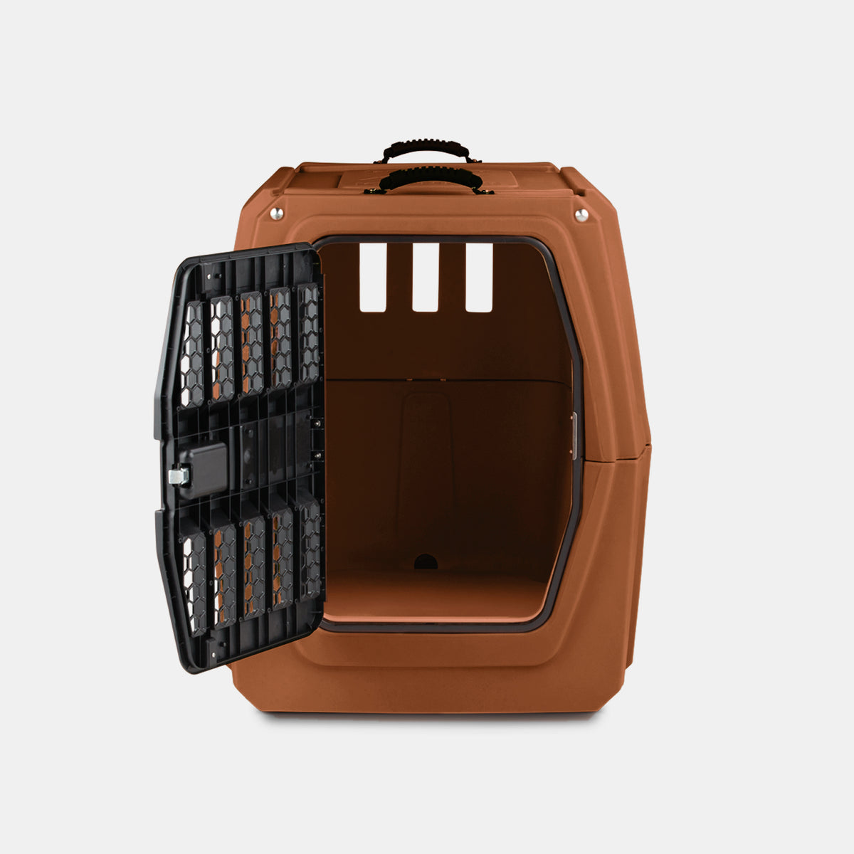 A brown pet carrier with a black open door, showing the empty interior. Designed as a portable dog kennel, the carrier features ventilation slots at the back and a handle on top, making it ideal for travel or outdoor gear. Set against a plain white background.