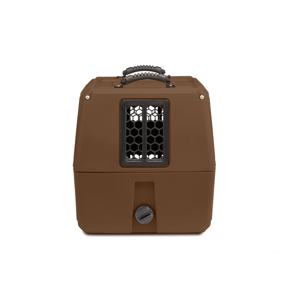 The GUNNER G1™ KENNEL in Susquehanna/Mossy Oak Shadow Grass features a black top handle, a center ventilated window, and a round bottom latch—ideal for duck and goose hunters. Shown in the signature Archive Series pattern on white.