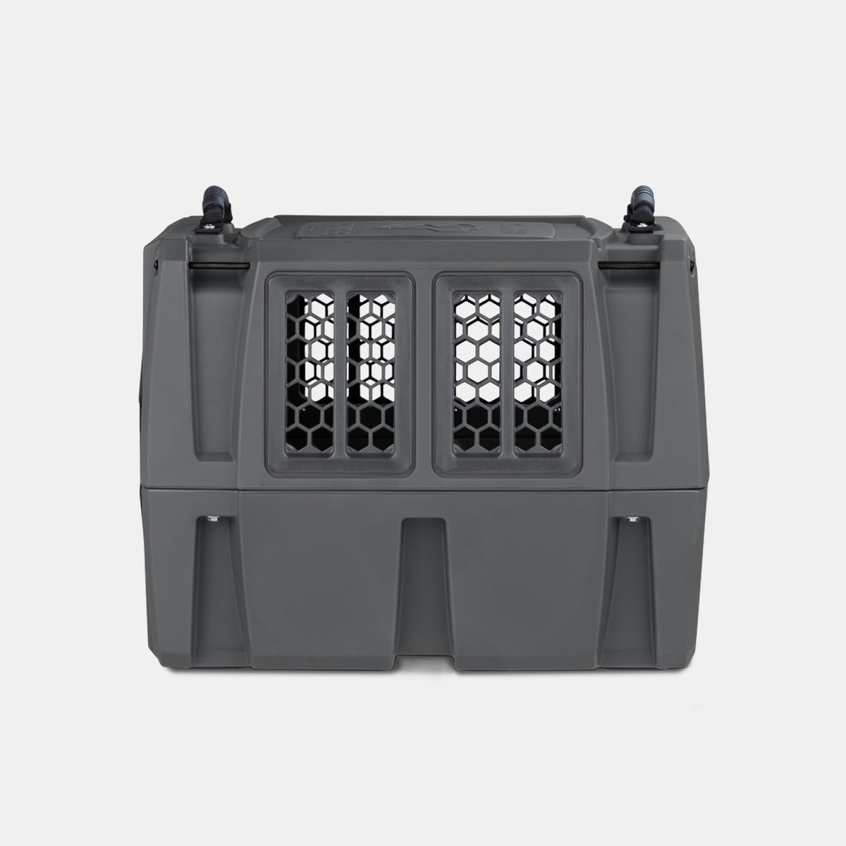A gray hard-sided dog crate with hexagonal ventilation holes on the front and secure latches on top, ideal for transporting a working dog or hunting dog, shown against a plain white background.