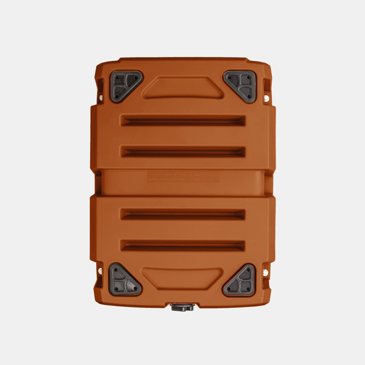 A rectangular, rust-orange hard shell suitcase with four black corner protectors and horizontal ridges, resembling a stylish dog crate, viewed from above on a white background.