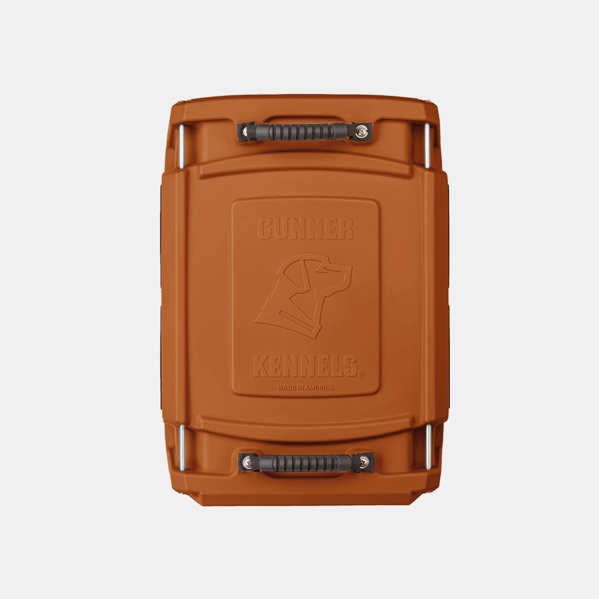 A brown, hard-sided dog crate with embossed Gunner Kennels logo and two black handles, shown from above against a white background—perfect for safely transporting your working dog.