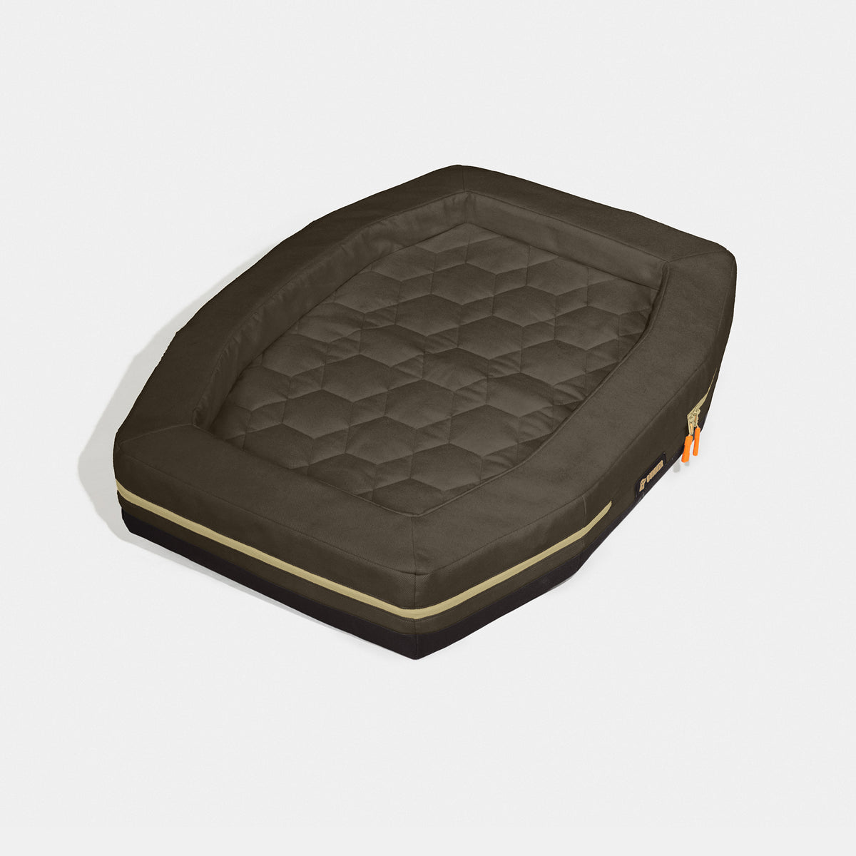 The GUNNER HOMESTEAD DOG BED in Special-Edition Pheasant Brown features a rectangular, quilted design with raised edges, hexagon-patterned sleeping surface, and orange zipper pulls—supporting Pheasants Forever with durable outdoor style.