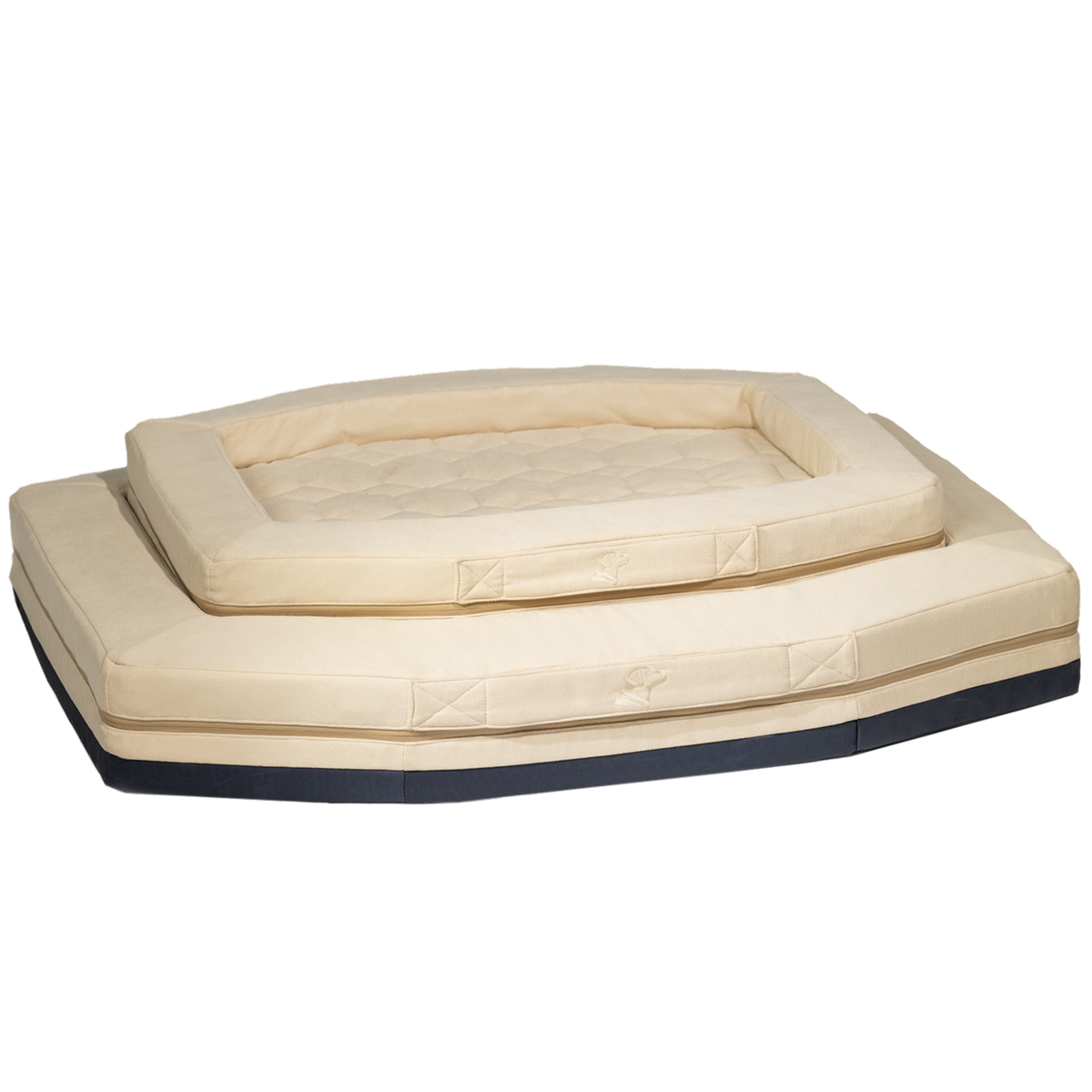 Two stacked GUNNER HOMESTEAD DOG BED Oak pet beds feature quilted, padded beige surfaces for comfort. The top bed has raised edges; the bottom one has a navy blue base. Both are durable and easy to clean for lasting use.