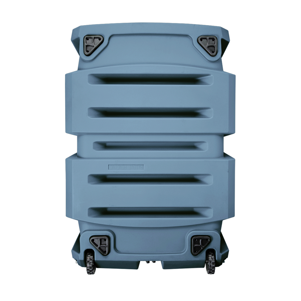 The GUNNER G1™ KENNEL - Ducks Unlimited Blue stands upright with four black wheels, robust built-in corner latches, deep horizontal grooves, and a rugged industrial design reminiscent of a hard-shell suitcase.