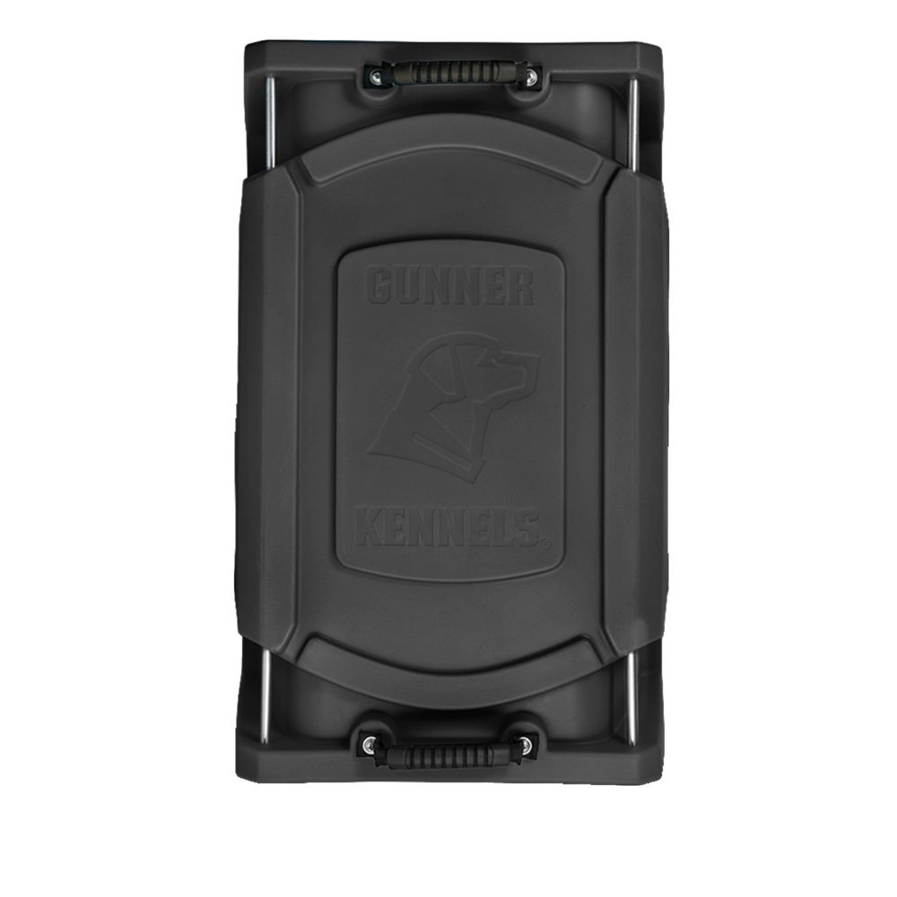 Top view of the GUNNER G1™ KENNEL - BLACK, a durable hard-sided dog crate with sturdy handles on both ends and an embossed dog head logo and GUNNER brand name on the lid.