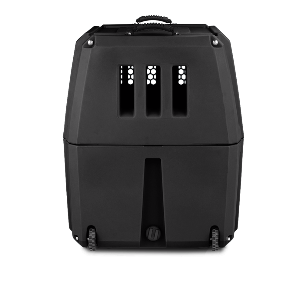 The GUNNER G1™ KENNEL - BLACK is a durable hard-shell dog crate with front ventilation slits and small bottom wheels, shown against a plain white background.