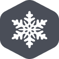 A white snowflake icon with six branches is centered on a dark gray hexagonal background, representing durability and reliability for outdoor gear.