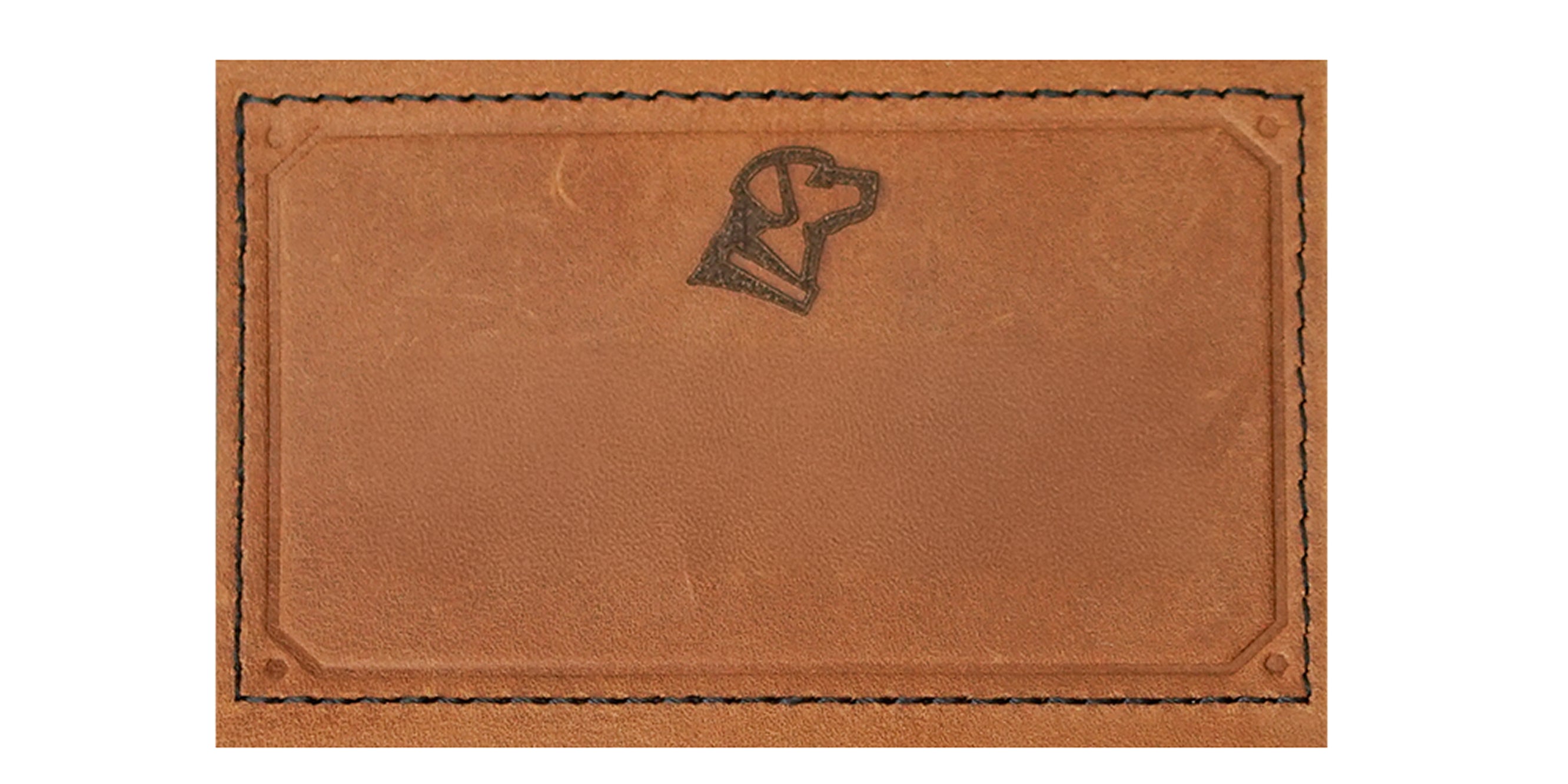 A rectangular brown leather patch with black stitching around the edges and an embossed outline of a hunting dogs head in the upper center.