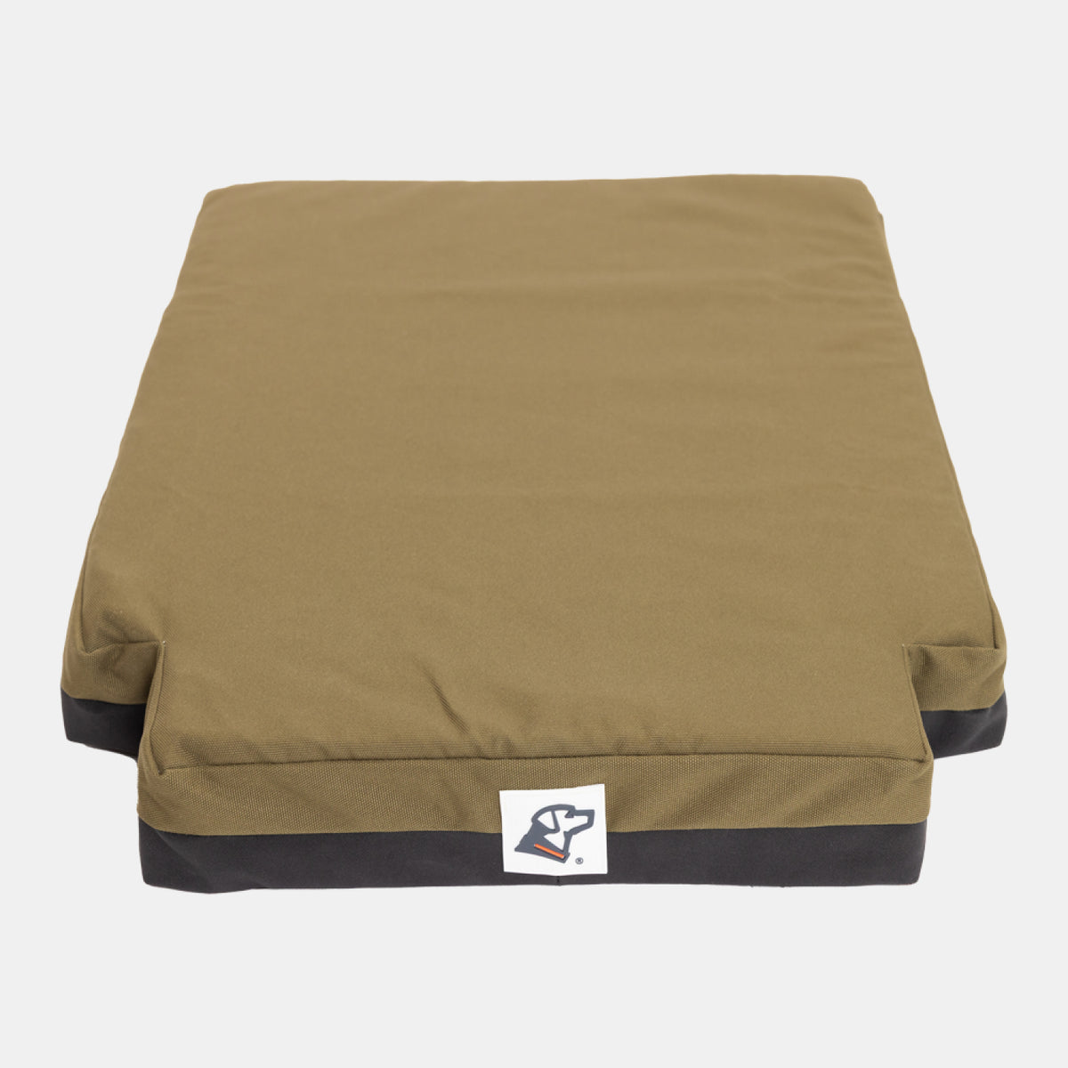 Rectangular olive green and black dog bed with a logo of a dogs head on the front center, designed to complement your working dog’s outdoor gear. The bed is placed on a white background.