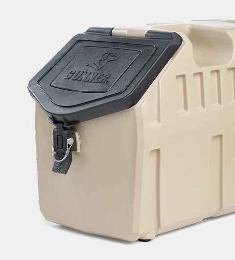 A beige, heavy-duty plastic storage container with a black, lockable lid labeled GUNNER and a metal latch on the front—perfect for storing your dog kennel or hunting dog gear.