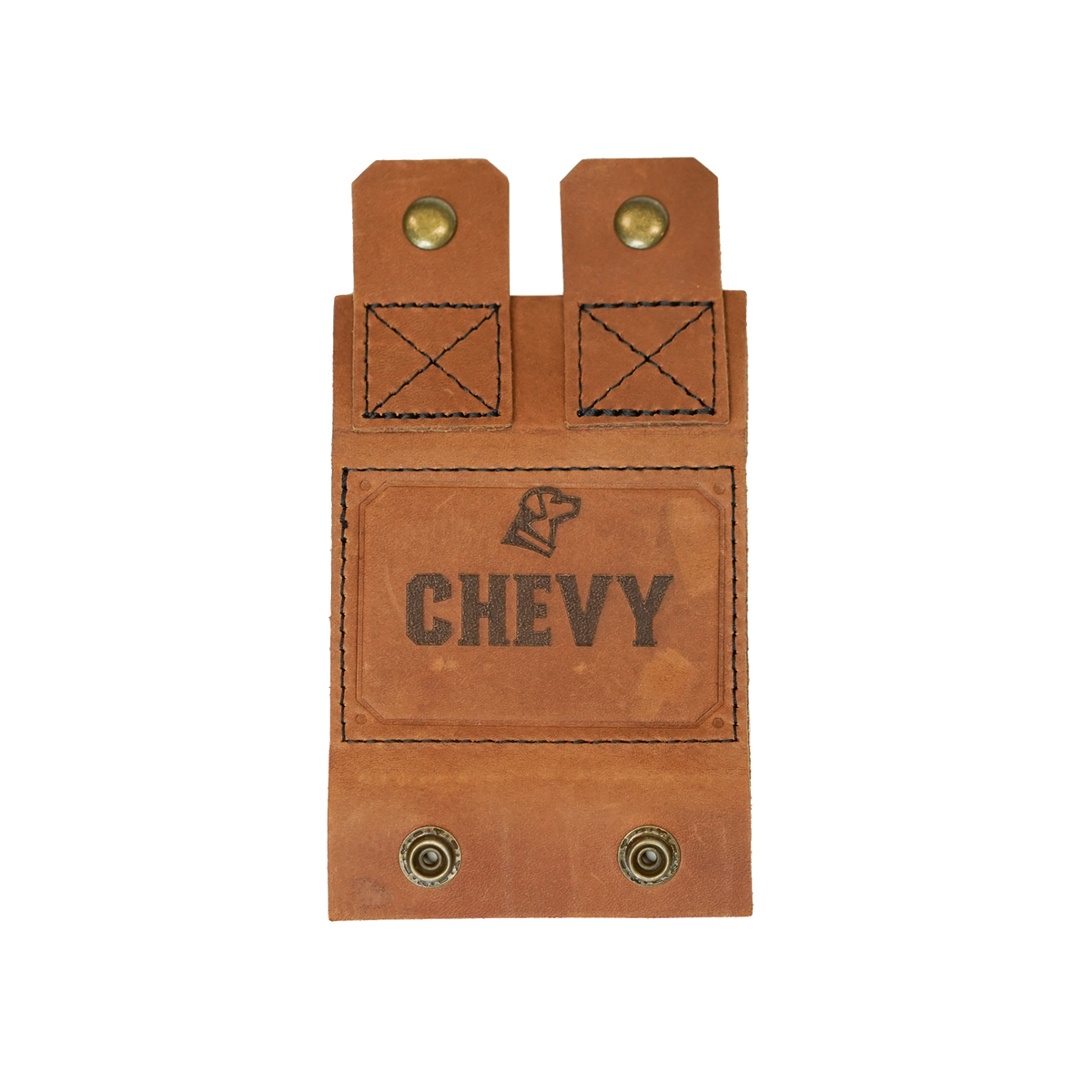 Brown leather DOG BED NAME TAG by GUNNER, featuring two snap buttons at the bottom and “CHEVY” stamped in bold letters with a line drawing of a dog’s head above—an ideal accessory for your Homestead Dog Bed.