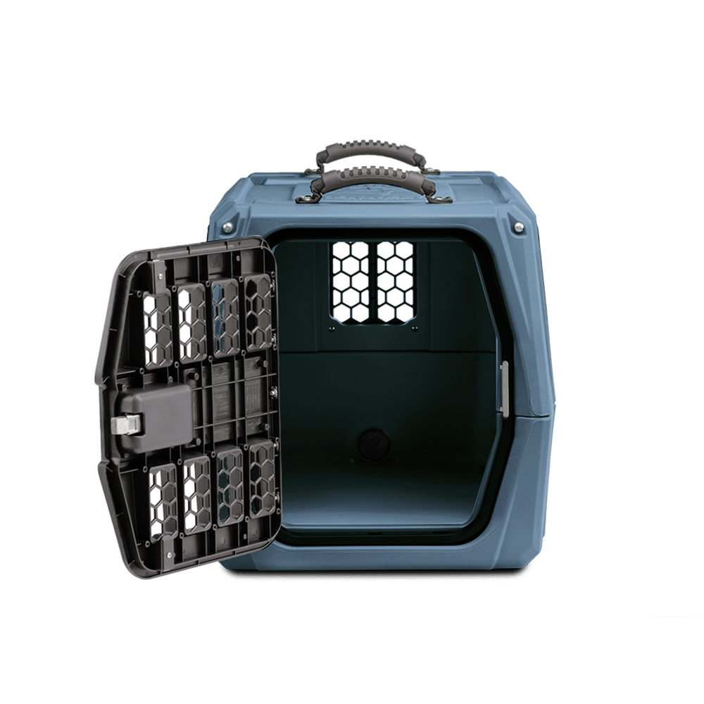 The GUNNER G1™ KENNEL - Ducks Unlimited Blue is a durable, spacious pet carrier with a black open door, top handle, and ventilation holes—trusted by waterfowl habitat advocates for safe travel.