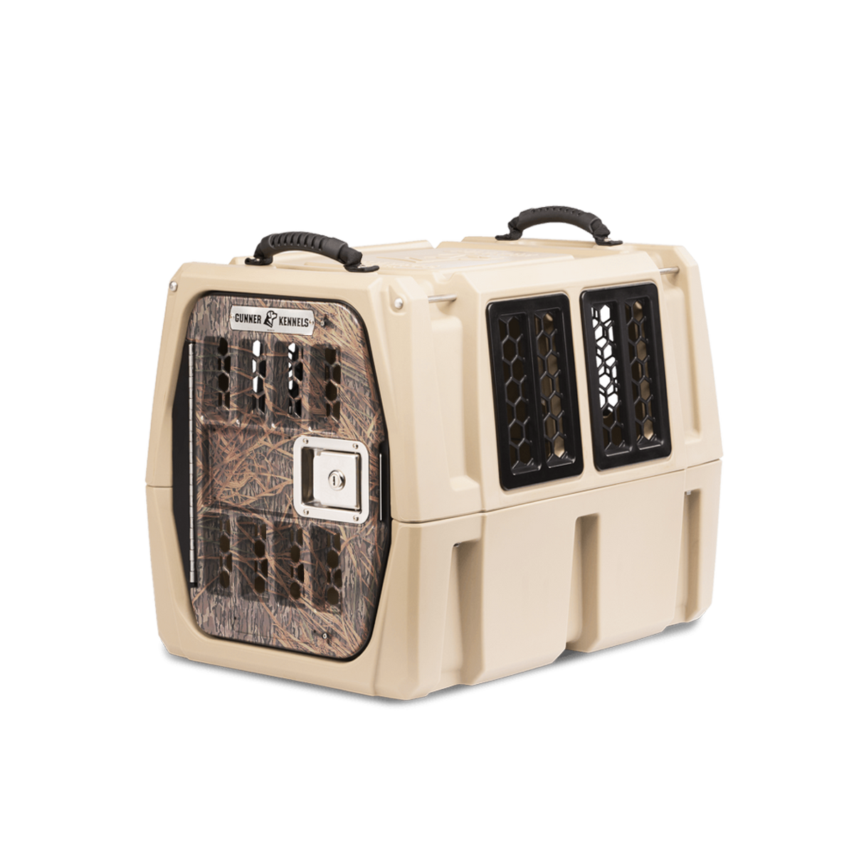 The GUNNER G1™ KENNEL - TAN/SHADOW GRASS is a tan, hard-sided dog crate with a camo-patterned door, black ventilation panels, and sturdy carry handles—offering style and one of the safest options for your dog.