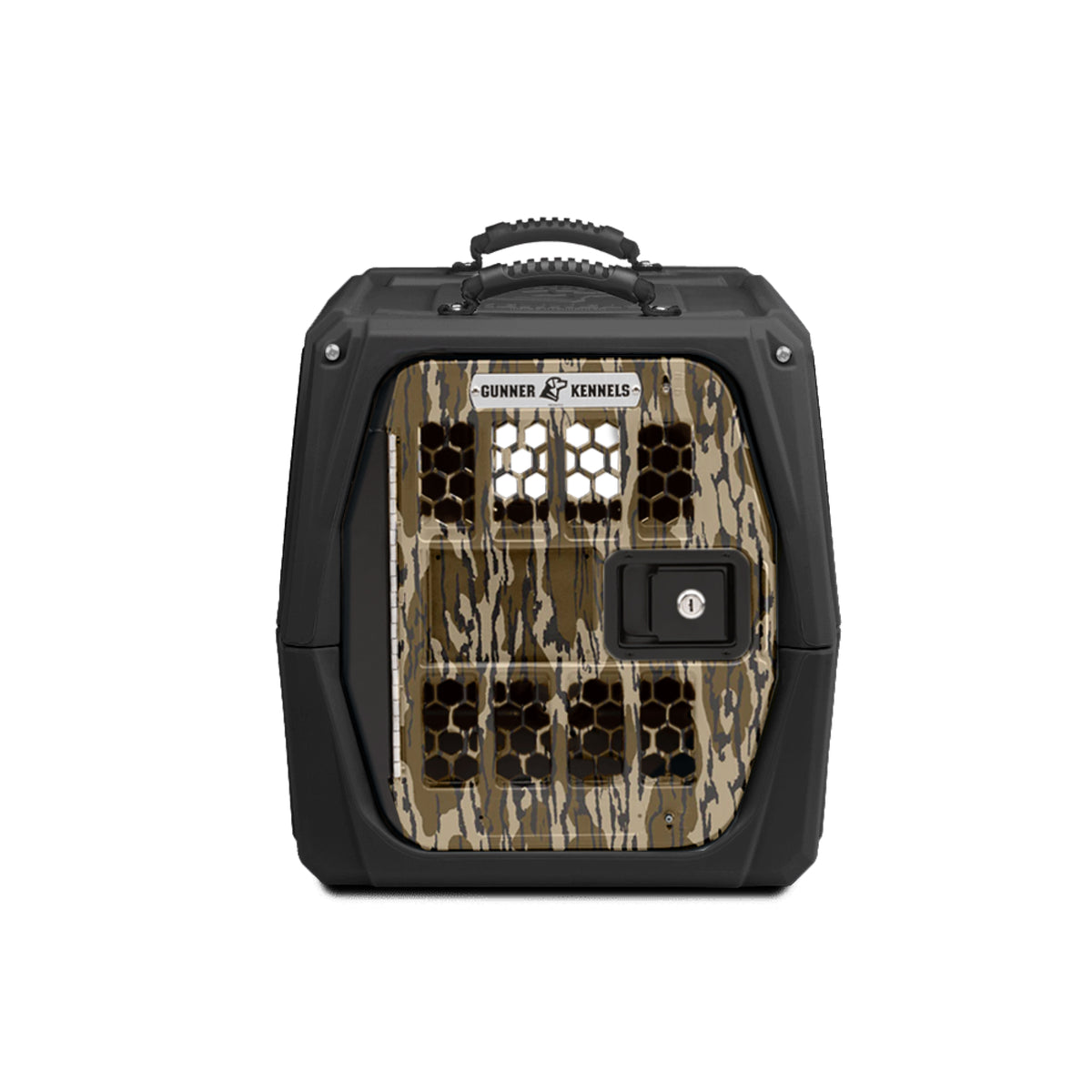The GUNNER G1™ KENNEL - MOSSY OAK BOTTOMLAND BLACK is a sturdy dog kennel with a secure latch door, ventilation holes, top handle, and a black camo pattern. The front label displays the GUNNER brand.