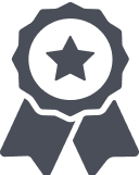 A gray icon of an award ribbon with a star in the center and two ribbons hanging down, symbolizing achievement or excellence—perfect for recognizing a top working dog in a kennel.