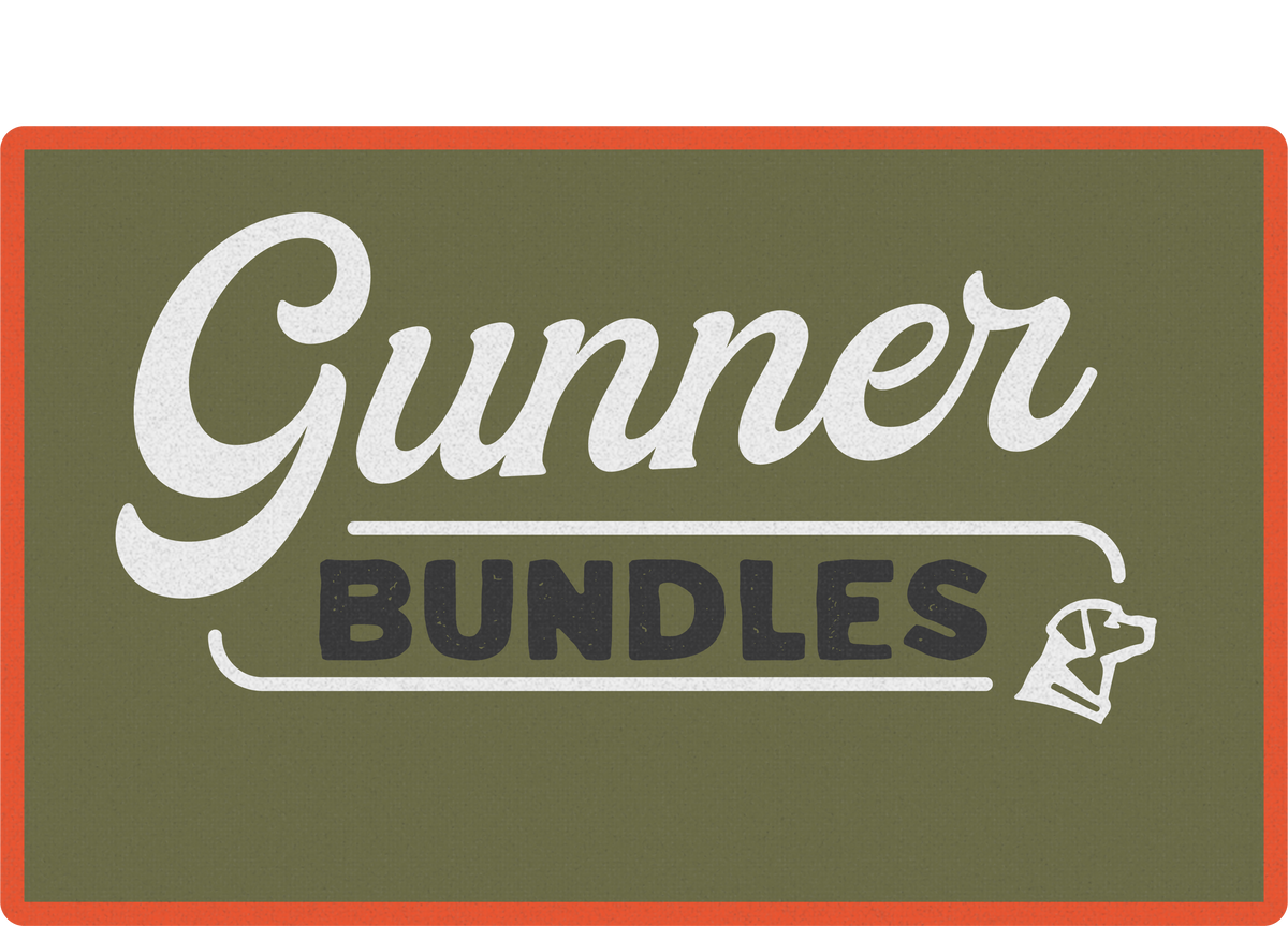 A green rectangular sign with an orange border displays the words Gunner Bundles in white and black text, with a small hunting dog head graphic next to the word BUNDLES—perfect for kennel or dog crate enthusiasts.