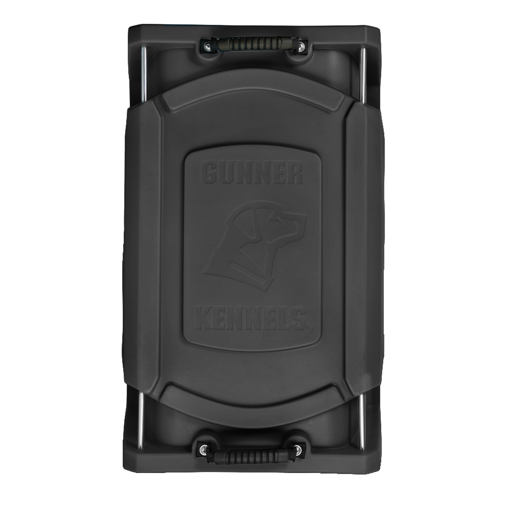 A top-down view of the GUNNER G1™ KENNEL - MOSSY OAK BOTTOMLAND BLACK lid, made of sturdy black plastic with embossed GUNNER text, dog head logo, and handles at the top and bottom.