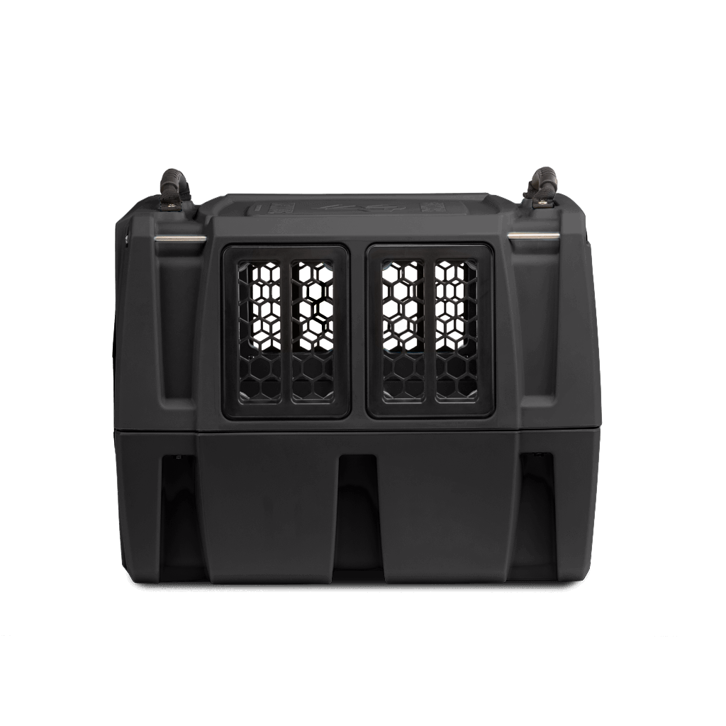The GUNNER G1™ KENNEL - MOSSY OAK BOTTOMLAND BLACK is a tough, black dog crate with dual front doors and hexagonal ventilation—crafted for security and comfort to help save lives. Shown on a plain white background.