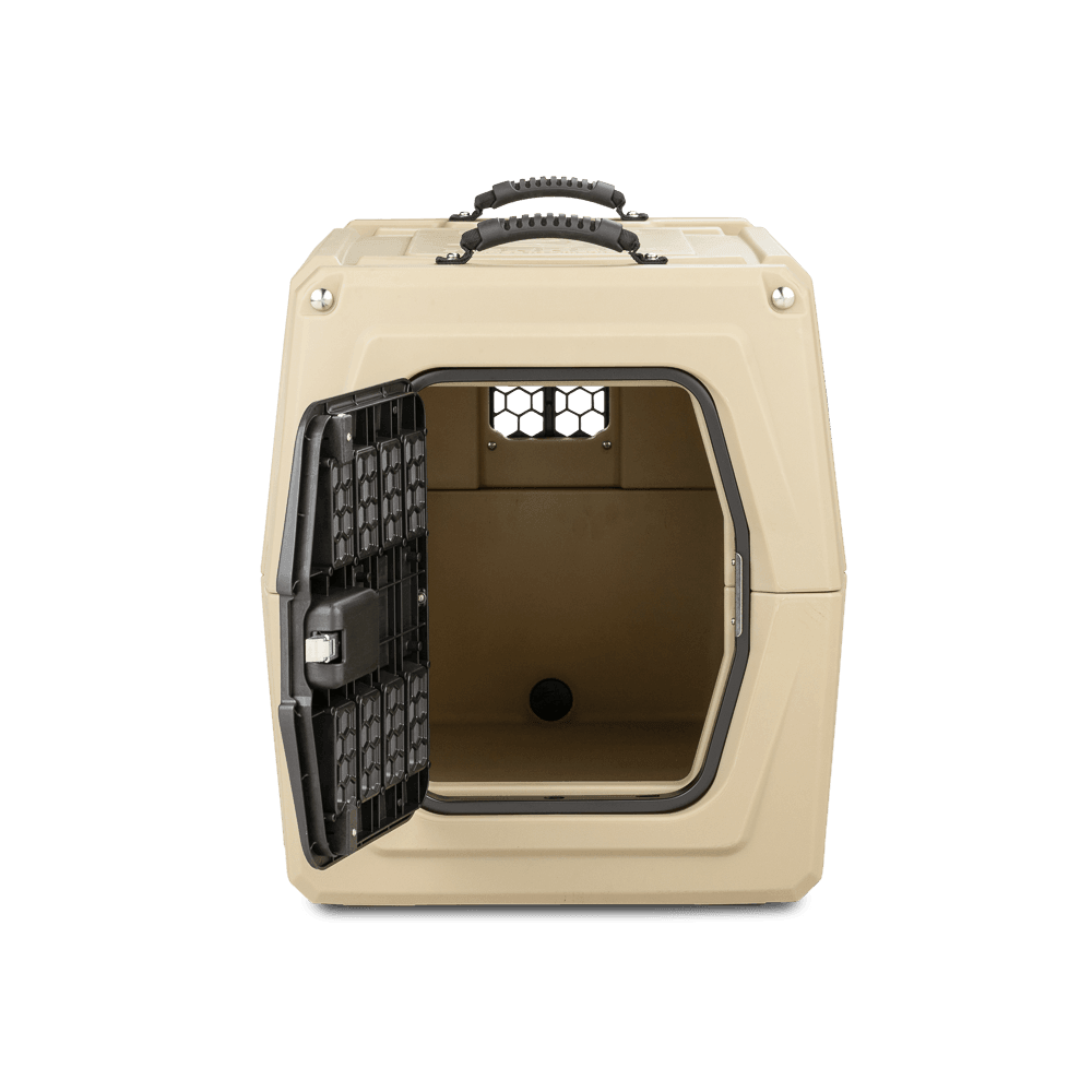 The GUNNER G1™ KENNEL - TAN, regarded as one of the safest dog crates, features a double-walled design with small ventilation windows, two top handles, and a black metal door that opens to reveal its empty interior.