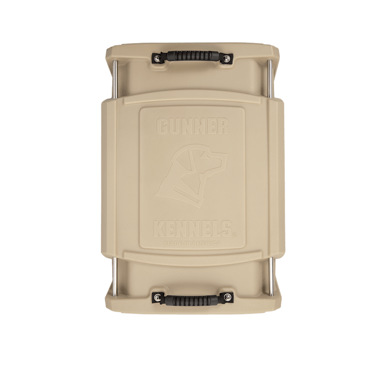 A tan GUNNER G1™ KENNEL – TAN/SHADOW GRASS dog crate viewed from above, featuring sturdy end handles and embossed branding with a dog profile and the words Gunner Kennels on the lid.