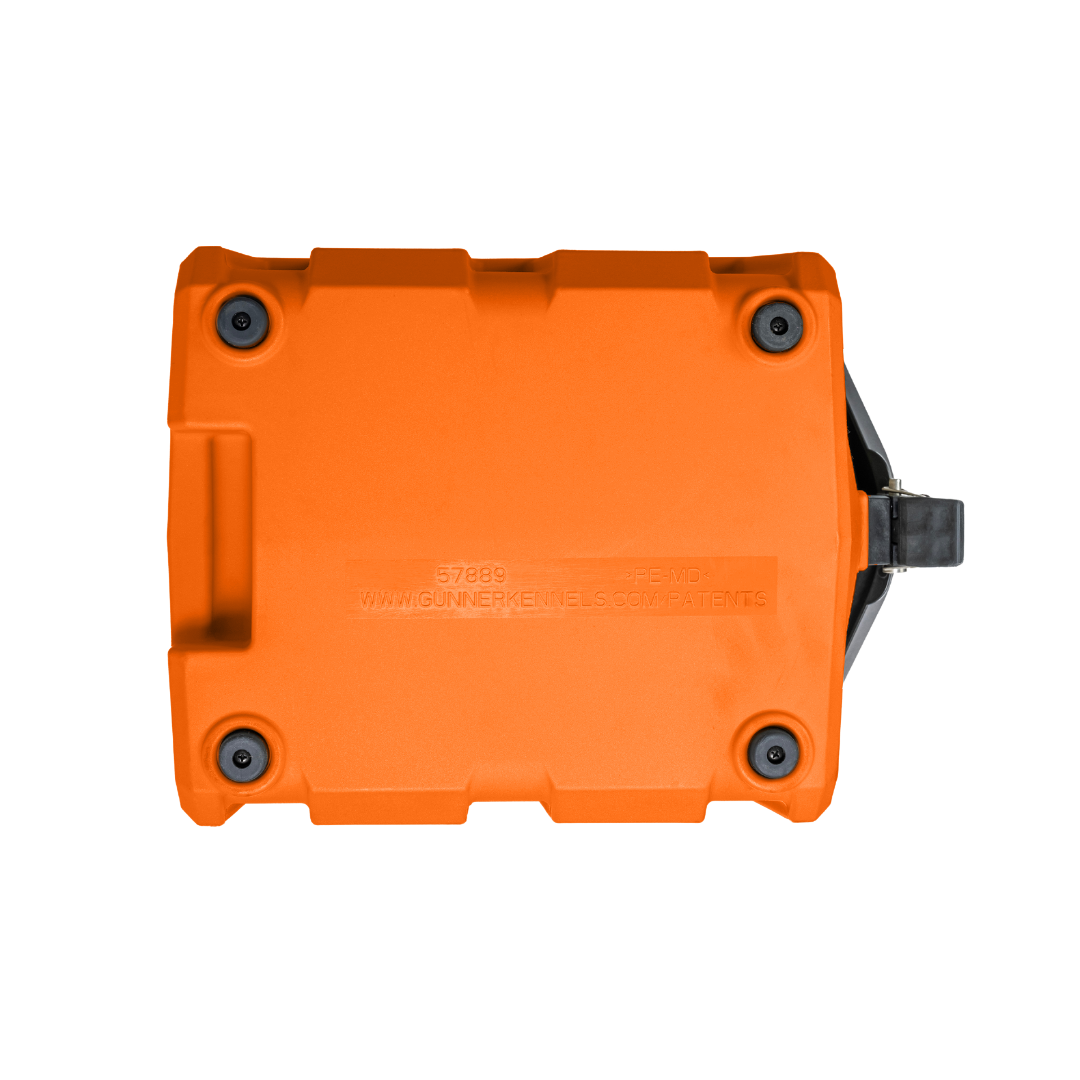 The GUNNER FOOD CRATE - BLAZE ORANGE by GUNNER is a limited-edition, orange rectangular hard case with four black corner screws and a right-side black handle, designed for dog food storage and shown on a plain white background.