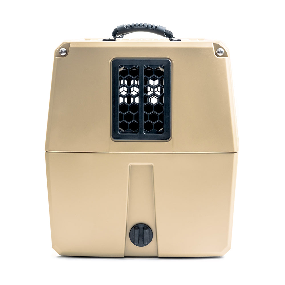 The GUNNER CHEW KIT is a beige hard-sided pet carrier with a black top handle and central black ventilated window, designed for secure small animal transport and protection similar to GUNNER kennels.