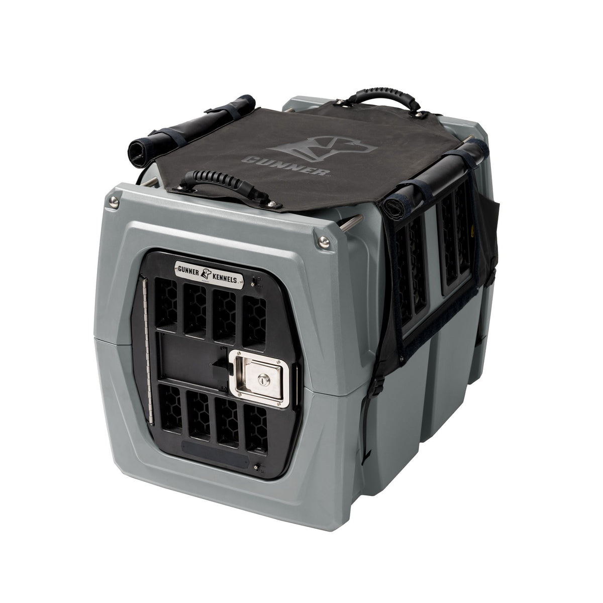 A durable gray GUNNER dog crate with ventilation holes, a secure metal door, top handle, black latches, and visible GUNNER logo; compatible with the ALL-WEATHER KIT 2.0 or a waterproof kennel cover.