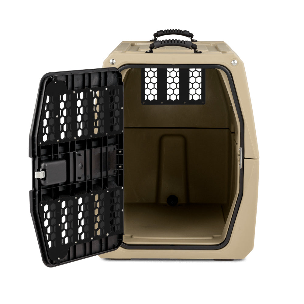 A beige hard-sided CHEW KIT pet carrier by GUNNER with a black, ventilated open door, top handle, and rectangular ventilation holes on the upper back wall. The empty interior is visible.