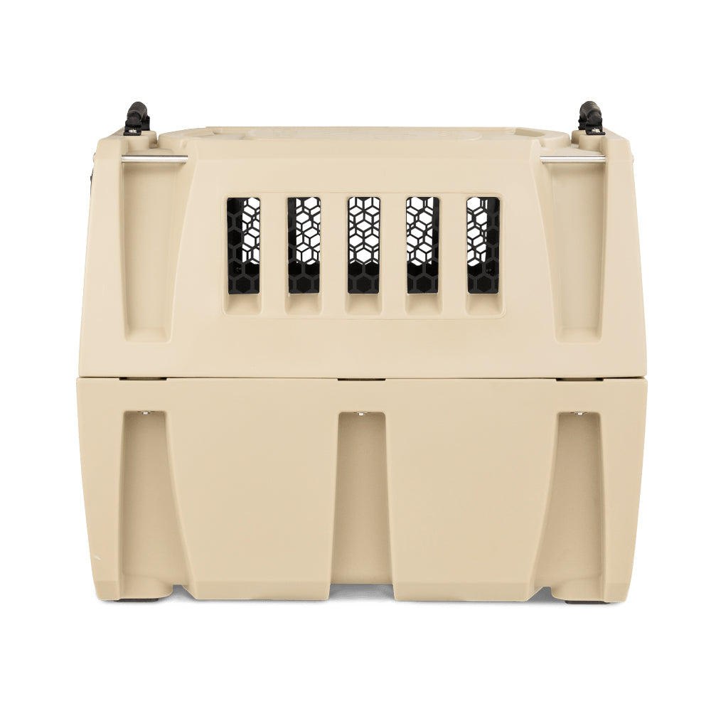 A beige GUNNER CHEW KIT made of hard plastic with front ventilation holes and black metal latches on the top corners, shown from a front view—ideal for dog kennel protection.